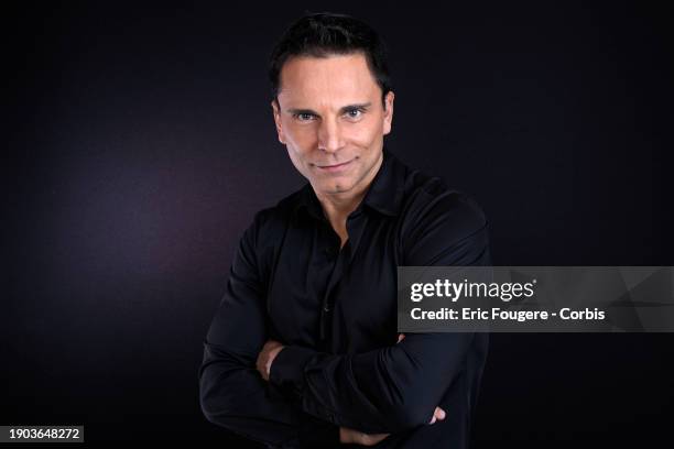 Singer Allan Theo poses during a portrait session in Paris, France on .