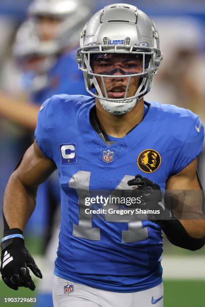 Amon-Ra St. Brown of the Detroit Lions plays against the Green Bay Packers at Ford Field on November 23, 2023 in Detroit, Michigan.