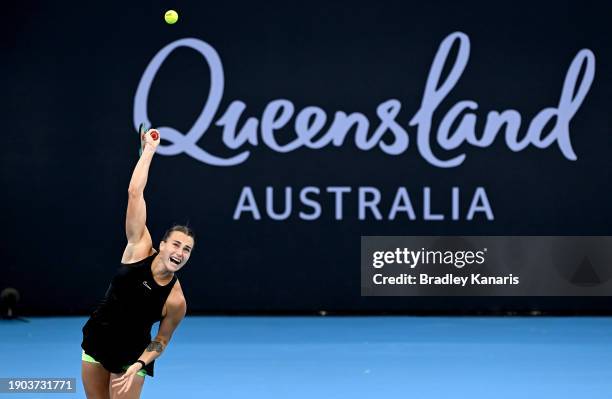 Aryna Sabalenka of Belarus serves in her match against Lucia Bronzetti of Italy during day four of the 2024 Brisbane International at Queensland...