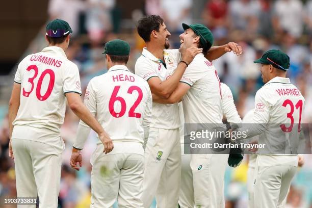 Mitchell Starc of Australia celebrates the wicket of Agha Salman of Pakistan during day one of the Men's Third Test Match in the series between...