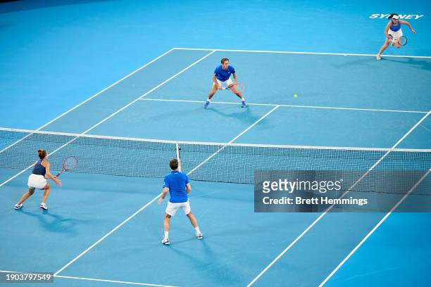 Flavio Cobolli of Italy and Nuria Brancaccio of Italy compete in their Group D doubles match against Elixane Lechemia of France and Edouard...