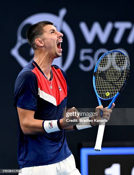 Alexei Popyrin of Australia celebrates after winning the first set in his match against Roman Safiullin of Russia during day four of the 2024...