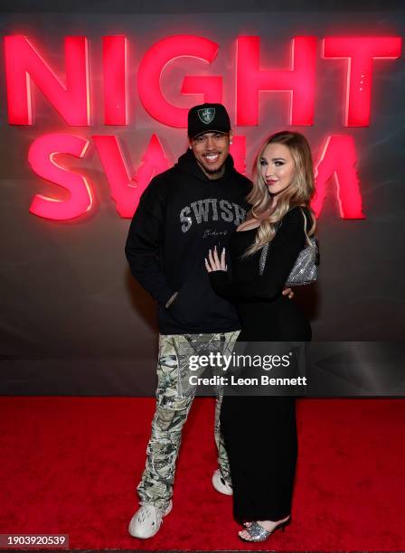 Landon "InkMonstarr" Nicoles and Kendra Sunderland attend a special NIGHT SWIM event, Presented by Universal Pictures, at Skybar on January 02, 2024...