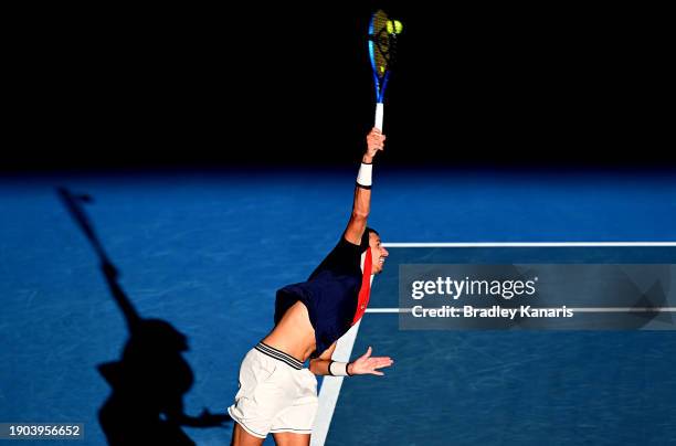 Alexei Popyrin of Australia serves in his match against Roman Safiullin of Russia during day four of the 2024 Brisbane International at Queensland...