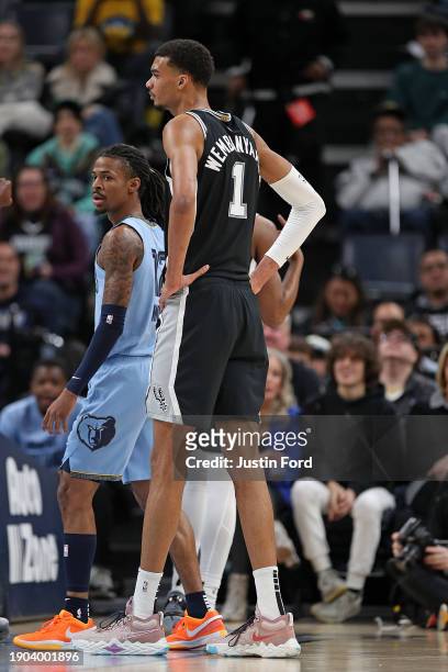 Ja Morant of the Memphis Grizzlies and Victor Wembanyama of the San Antonio Spurs during the game at FedExForum on January 02, 2024 in Memphis,...