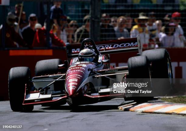 Scott Pruett from the United States drives the Arciero-Wells Racing Reynard 99i Toyota RV8D over the curbs during the Championship Auto Racing Teams...