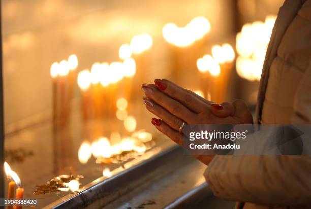 Clergyman leads a mas at the Saint Sarkis Cathedral as part of the Christmas celebration in Tehran, Iran on January 06, 2024. Orthodox Christians...
