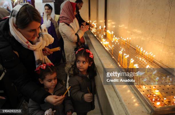 Clergyman leads a mas at the Saint Sarkis Cathedral as part of the Christmas celebration in Tehran, Iran on January 06, 2024. Orthodox Christians...
