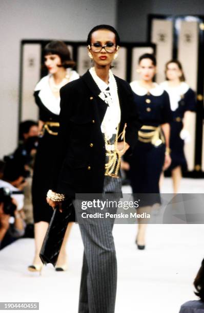 Model Iman walks in the Chanel Spring 1982 Ready to Wear Runway Show on October 19 in Paris, France.