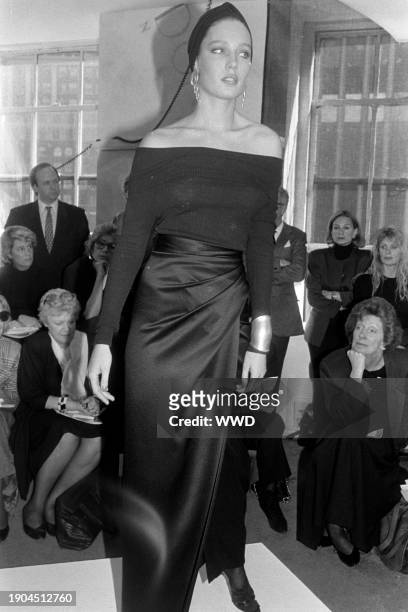 Model walks in the Donna Karan Spring 1986 Ready to Wear Runway Show on November 8 in New York City.