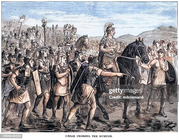 old engraved illustration of gaius julius caesar crossing the rubicon river - julius caesar emperor stock pictures, royalty-free photos & images