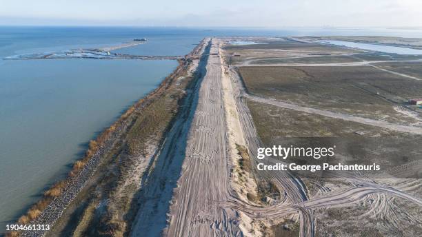 aerial photo of the sand road on the reclaimed land in amsterdam, ijburg - reclaimed stock pictures, royalty-free photos & images