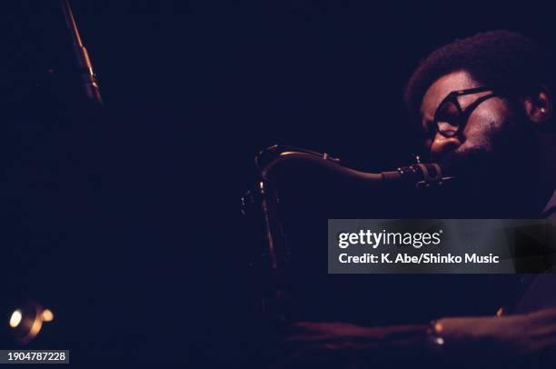 Profile of Joe Henderson playing his tenor saxophone, Junk, Ginza, Tokyo, Japan, 4th August 1971.