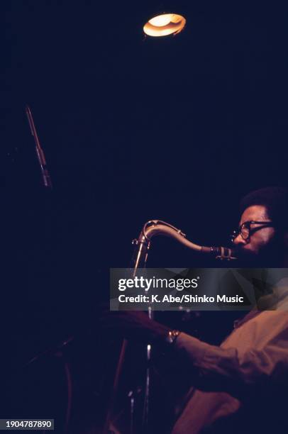 Profile of Joe Henderson playing his tenor saxophone, Junk, Ginza, Tokyo, Japan, 4th August 1971.