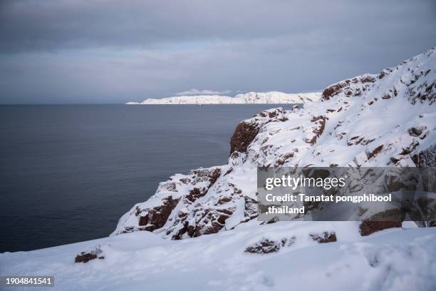 coast of the barents sea. teriberka. russia march - murmansk stock pictures, royalty-free photos & images