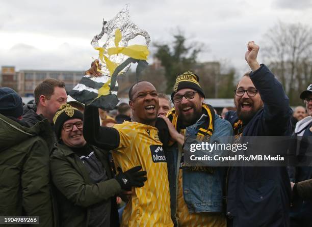 Gavin Hoyte captain of Maidstone United celebrates the victory with the fans & a Foil FA Cup Trophy during the Emirates FA Cup Third Round match...