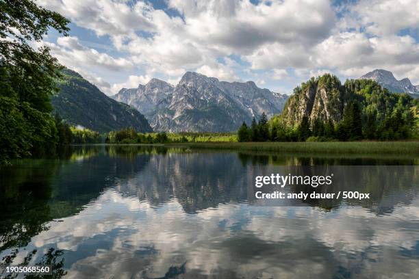 scenic view of lake and mountains against sky,styria,austria - andy dauer stockfoto's en -beelden