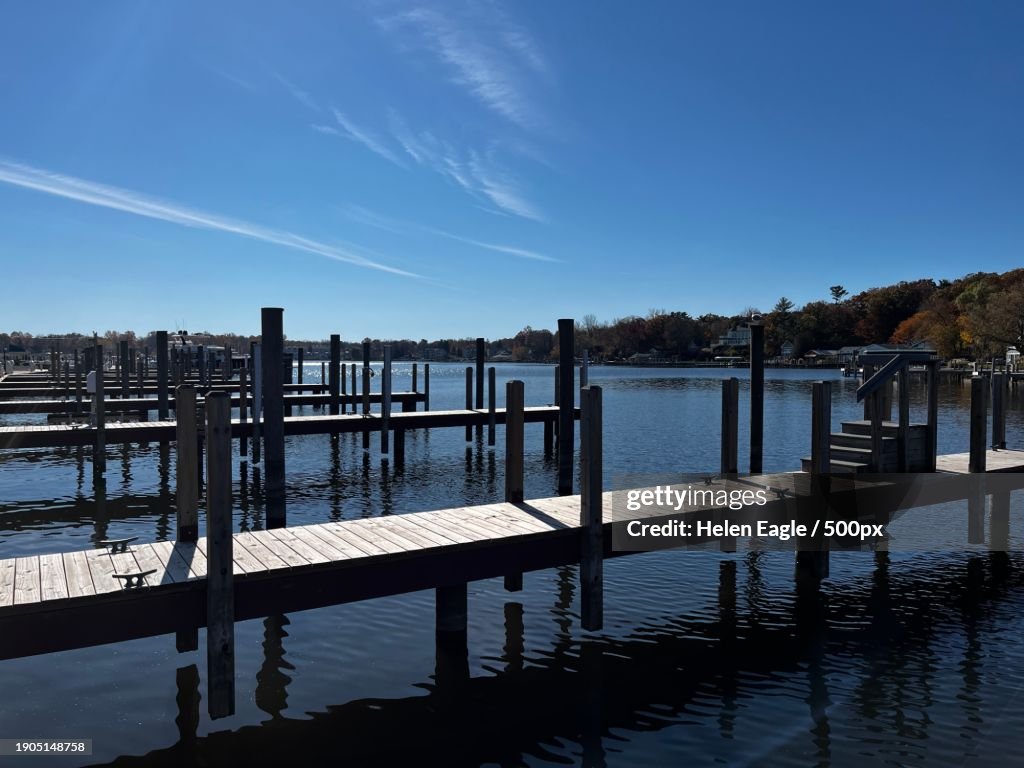 Scenic view of lake against blue sky,Saugatuck,Michigan,United States,USA