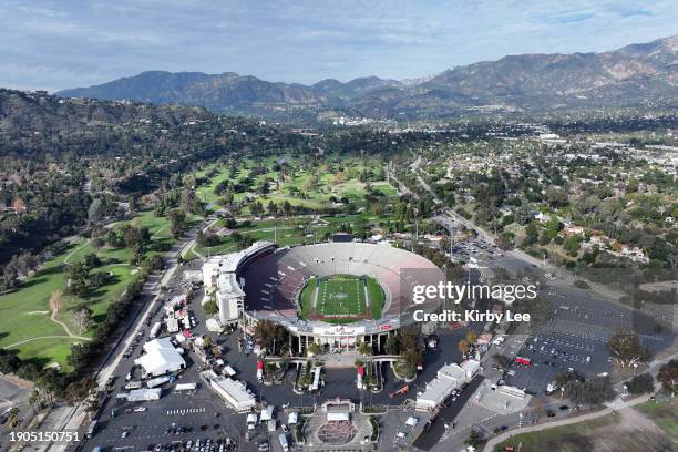 General overall aerial view of Rose Bowl Stadium with football field with Alabama Crimson Tide and Michigan Wolverines logos and San Gabriel...
