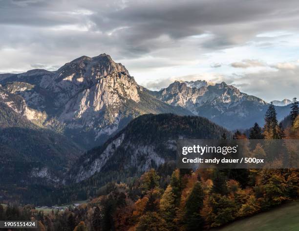 scenic view of mountains against sky during winter - andy dauer stockfoto's en -beelden