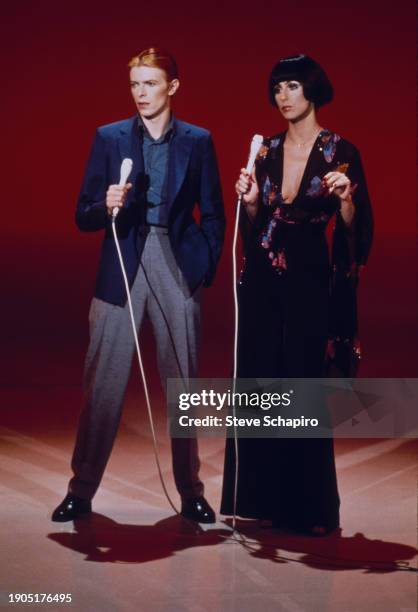 English musician and actor David Bowie performs a duet with Cher on the latter's 'Cher' television show, Los Angeles, California, November 23, 1975.