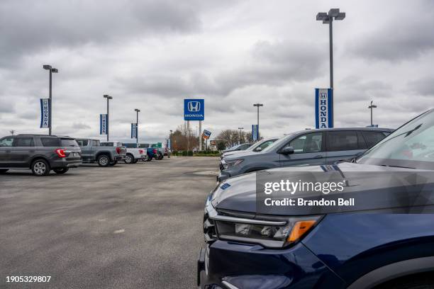Honda vehicles are seen for sale on a dealership lot on January 03, 2024 in San Marcos, Texas. Auto sales rose sharply within the first nine months...