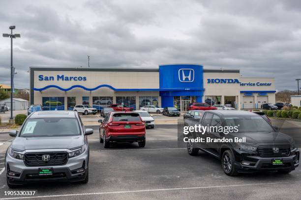 Honda vehicles are seen for sale on a dealership lot on January 03, 2024 in San Marcos, Texas. Auto sales rose sharply within the first nine months...