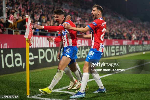 Valery Fernandez of Girona FC celebrates after scoring their team's first goal during the LaLiga EA Sports match between Girona FC and Atletico...