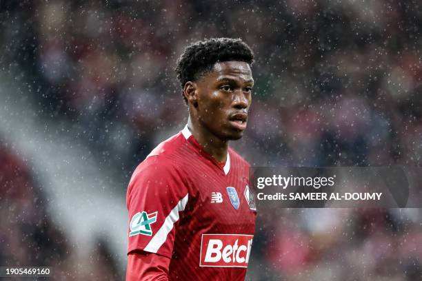 Lille's Canadian forward Jonathan David eyes the match during the French Cup football match between Lille LOSC and Golden Lion FC at the...