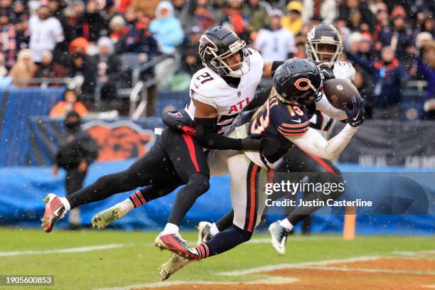 Mike Hughes of the Atlanta Falcons breaks up a pass intended for Tyler Scott of the Chicago Bears at Soldier Field on December 31, 2023 in Chicago,...