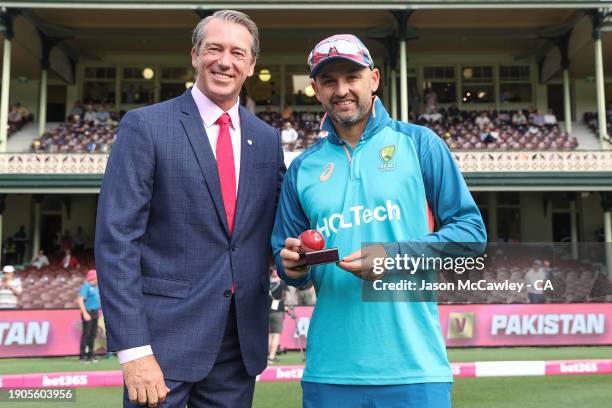 Nathan Lyon of Australia poses with Glenn McGrath after been presented with the 500th test wicket match ball during day two of the Men's Third Test...