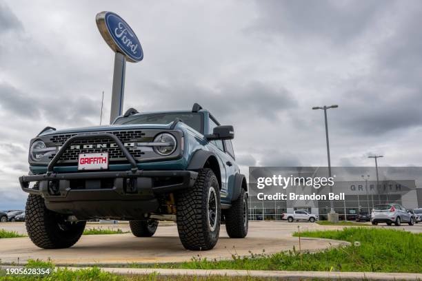 Ford Bronco is seen for sale on the Griffith Ford dealership lot on January 03, 2024 in San Marcos, Texas. Auto sales rose sharply within the first...