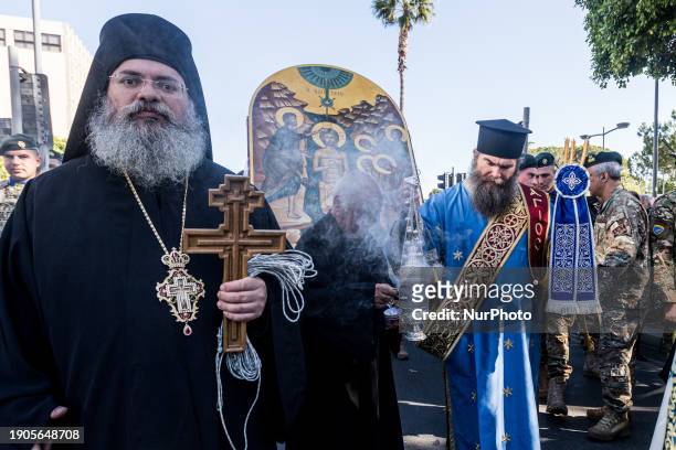 The icon of the baptism of Jesus is being seen during the procession in Limassol, Cyprus, on January 6, 2024. Epiphany Day celebrations are taking...