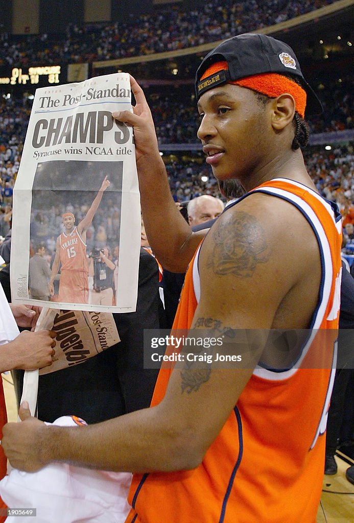 Anthony holds paper