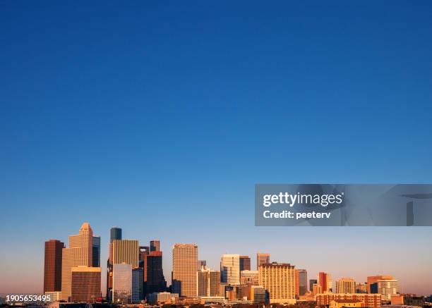 houston downtown at sunset - houston stock pictures, royalty-free photos & images