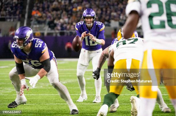Garrett Bradbury of the Minnesota Vikings snaps the ball to Nick Mullens in the fourth quarter of the game against the Green Bay Packers at U.S. Bank...