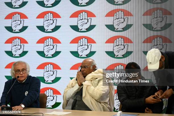 Congress President Mallikarjun Kharge, along with Congress leaders Jairam Ramesh and KC Venugopal, during the launch of the logo and slogan for...