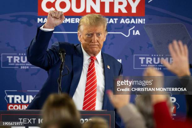 Former US President and Republican presidential hopeful Donald Trump speaks during a "Commit to Caucus" rally in Newton, Iowa, on January 6, 2024.
