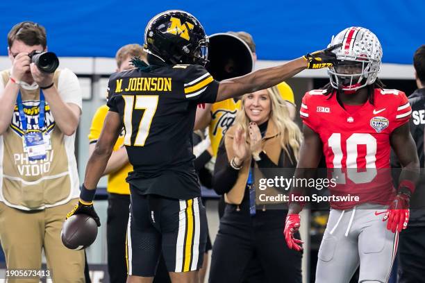 Missouri wide receiver Marquis Johnson signals for a first down after a reception during the 88th annual Cotton Bowl game between the Missouri Tigers...