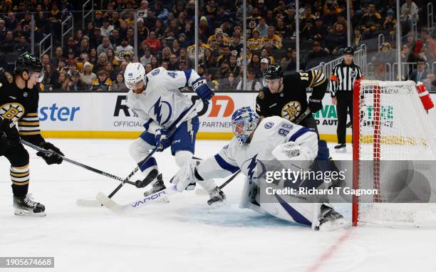 Trent Frederic of the Boston Bruins flips the puck past Andrei Vasilevskiy of the Tampa Bay Lightning for a goal during the first period at the TD...