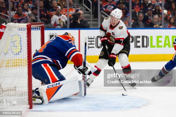 Brady Tkachuk of the Ottawa Senators takes a shot against goaltender Stuart Skinner of the Edmonton Oilers during the second period at Rogers Place...