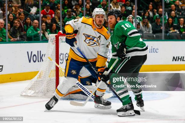 Nashville Predators defenseman Ryan McDonagh and Dallas Stars center Joe Pavelski fight for position in front of the net during the game between the...