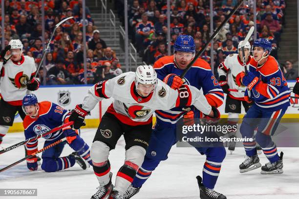 Ottawa Senators Center Tim Stutzle blocks Edmonton Oilers Left Wing Adam Erne in the first period of the Edmonton Oilers game versus the Ottawa...