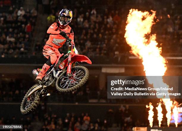 Anaheim, CA Jett Lawrence celebrates after taking the checkered flag to win the 450SX Main Event during round 1 of the Monster Energy AMA Supercross...