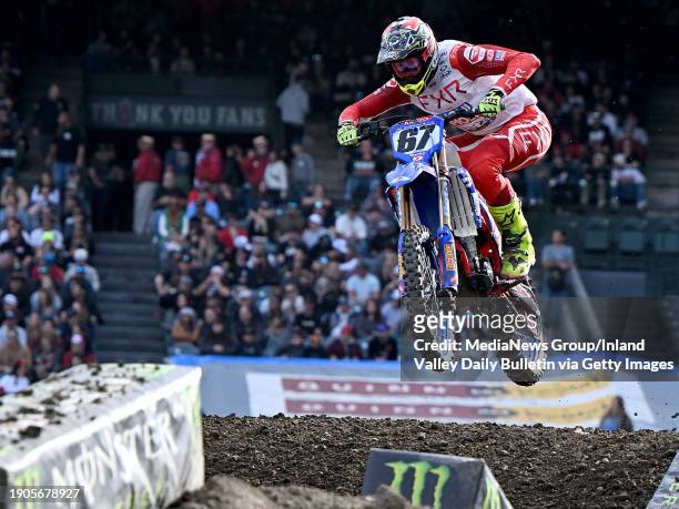 Anaheim, CA 450SX rider Benny Bloss takes a jump in the final qualifying sessions during round 1 of the Monster Energy AMA Supercross Championship at...