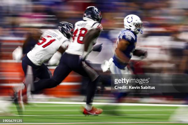 Jonathan Taylor of the Indianapolis Colts carries the ball during the fourth quarter of an NFL football game against the Houston Texans at Lucas Oil...