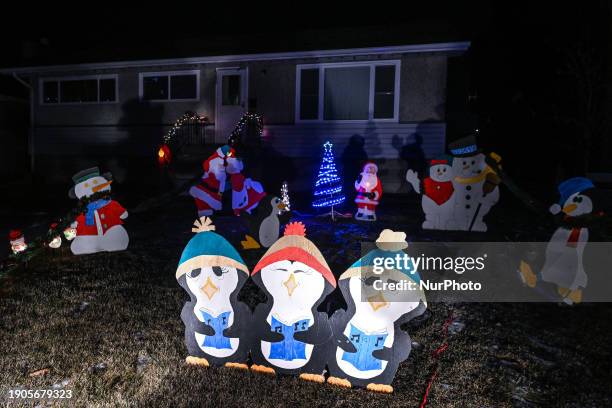 House decorated with Christmas lights in Candy Cane Line in Edmonton, Alberta, Canada, on December 30, 2023.