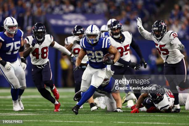 Jonathan Taylor of the Indianapolis Colts carries the ball during the third quarter of an NFL football game against the Houston Texans at Lucas Oil...