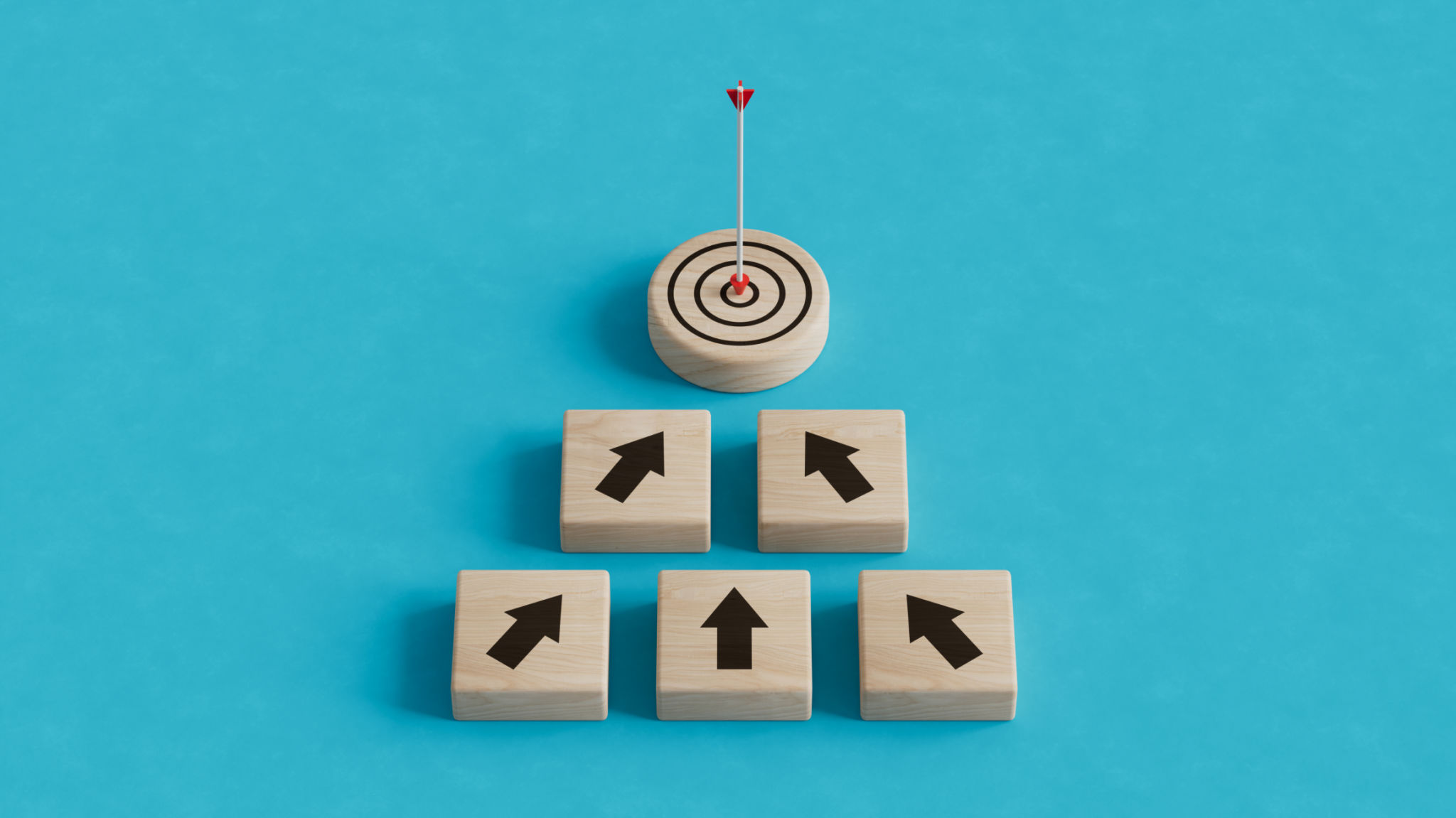 Financial goals concept with dart and target board wooden cube on up arrows. Target of investment and business concept. Financial goals concept with dart and target board wooden cube on up arrows. Target of investment and business concept.