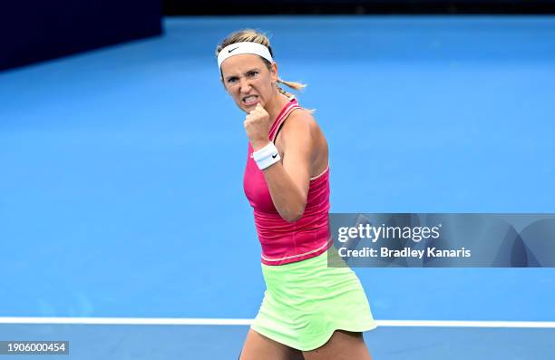 Victoria Azarenka of Belarus celebrates victory after her match against Clara Burel of France during day five of the 2024 Brisbane International at...